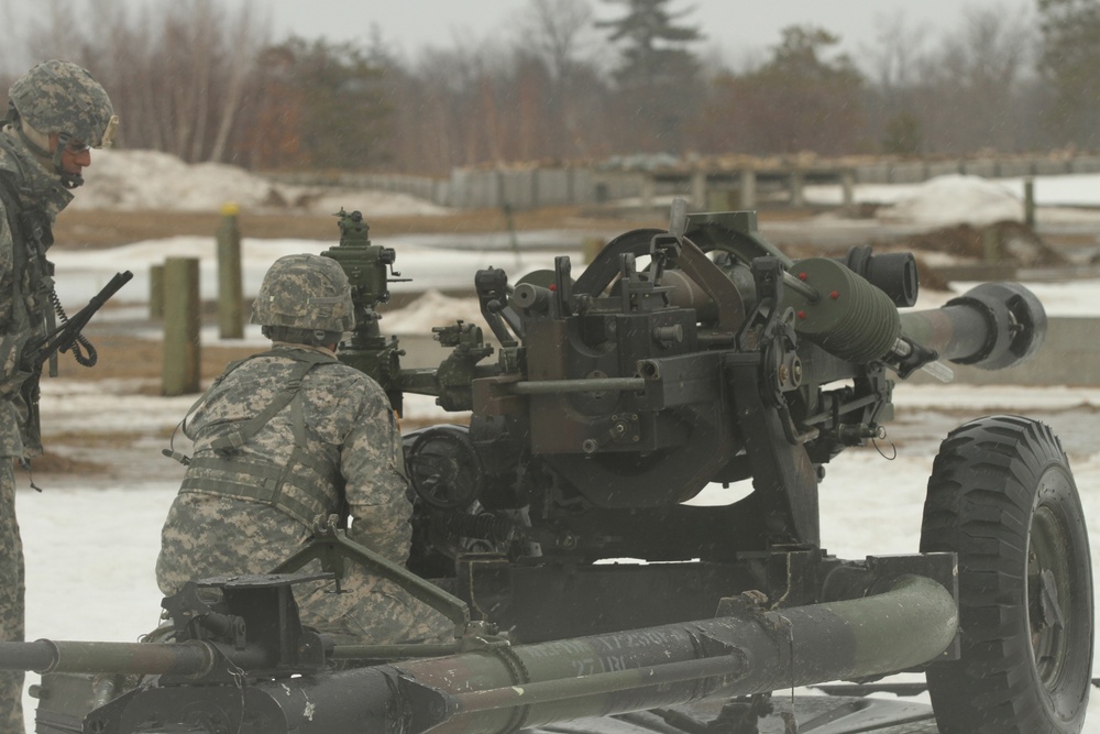 New York Army Guard artillerymen fire big guns at Fort Drum