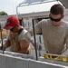 Belize Defence Force, US Air Force work side-by-side to build hospital addition in Belize