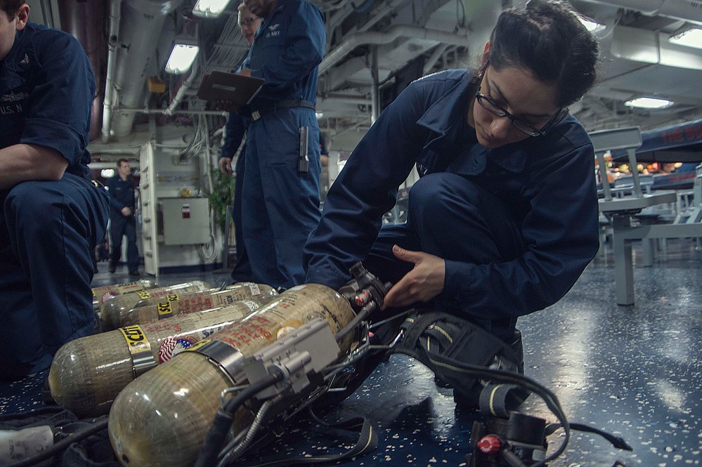 USS Harry S. Truman sailors check gear