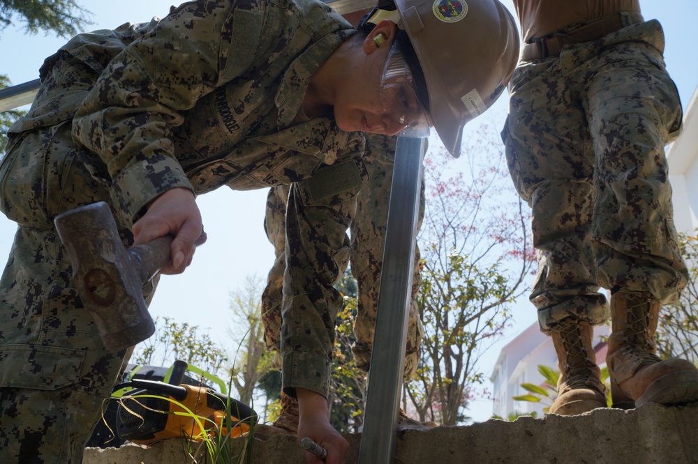 NMCB 1 DET Chinhae Sailors perform construction operations in Korea
