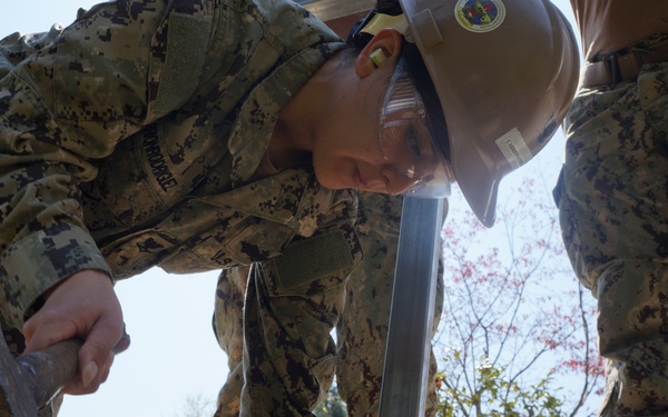 NMCB 1 DET Chinhae Sailors perform construction operations in Korea