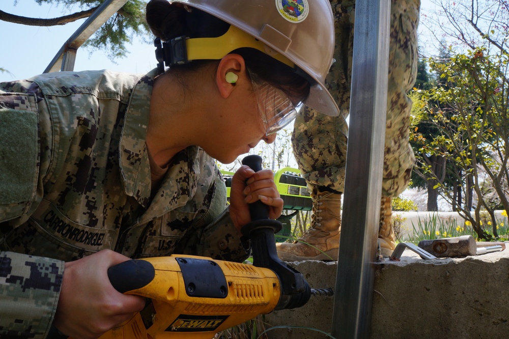 NMCB 1 DET Chinhae Sailors perform construction operations in Korea