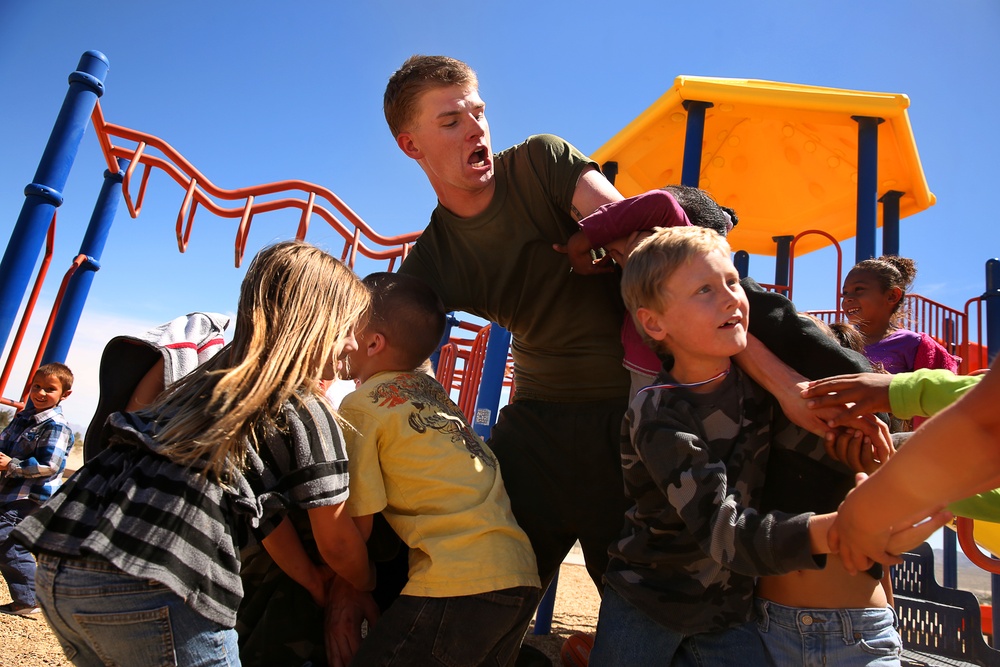 Marine, sailors visit kids