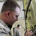 122nd ASB soldier repairs aircraft
