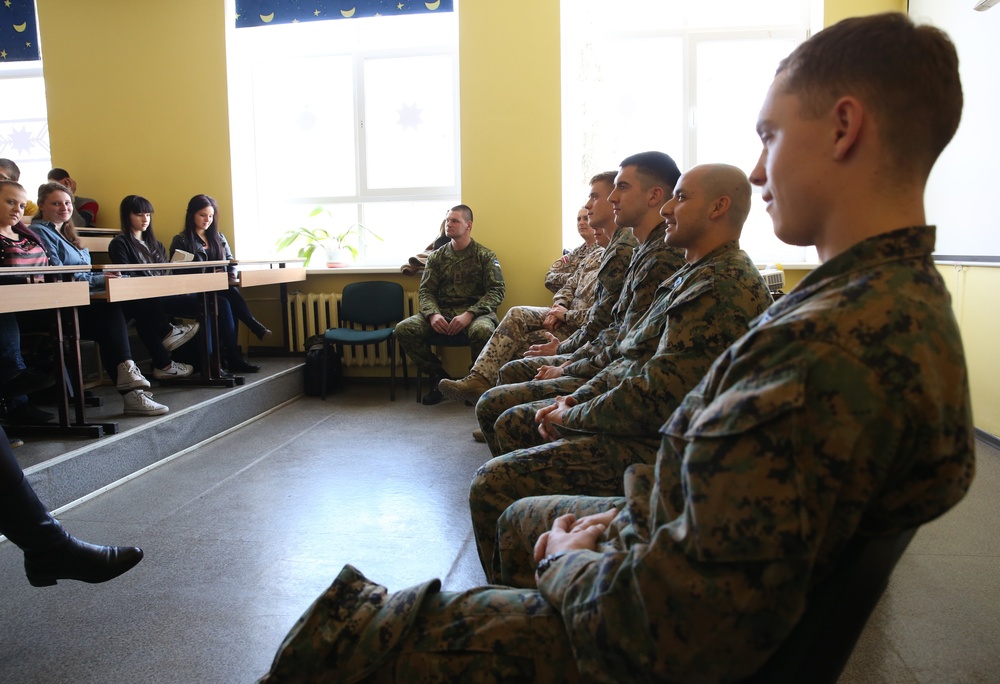 U.S. and Estonian service members meet with Latvian high school students