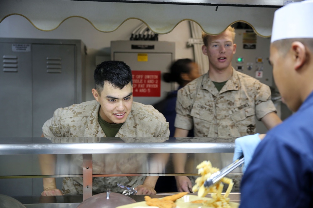 Dinner is served: 11th MEU Marines enjoy USS Makin Island galley