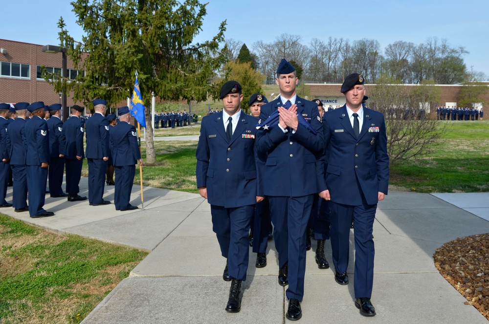 Airmen in ALS class 14-3 participates in graduation retreat ceremony