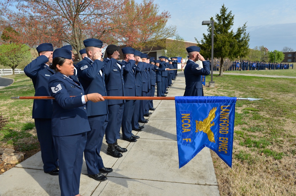 Airmen attending NCOA class 14-3 participate in graduation retreat ceremony