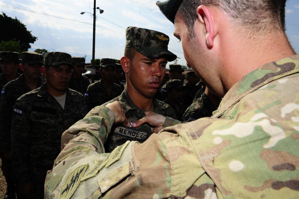 US Special Forces, Honduran paratroopers exchange wings after training jump