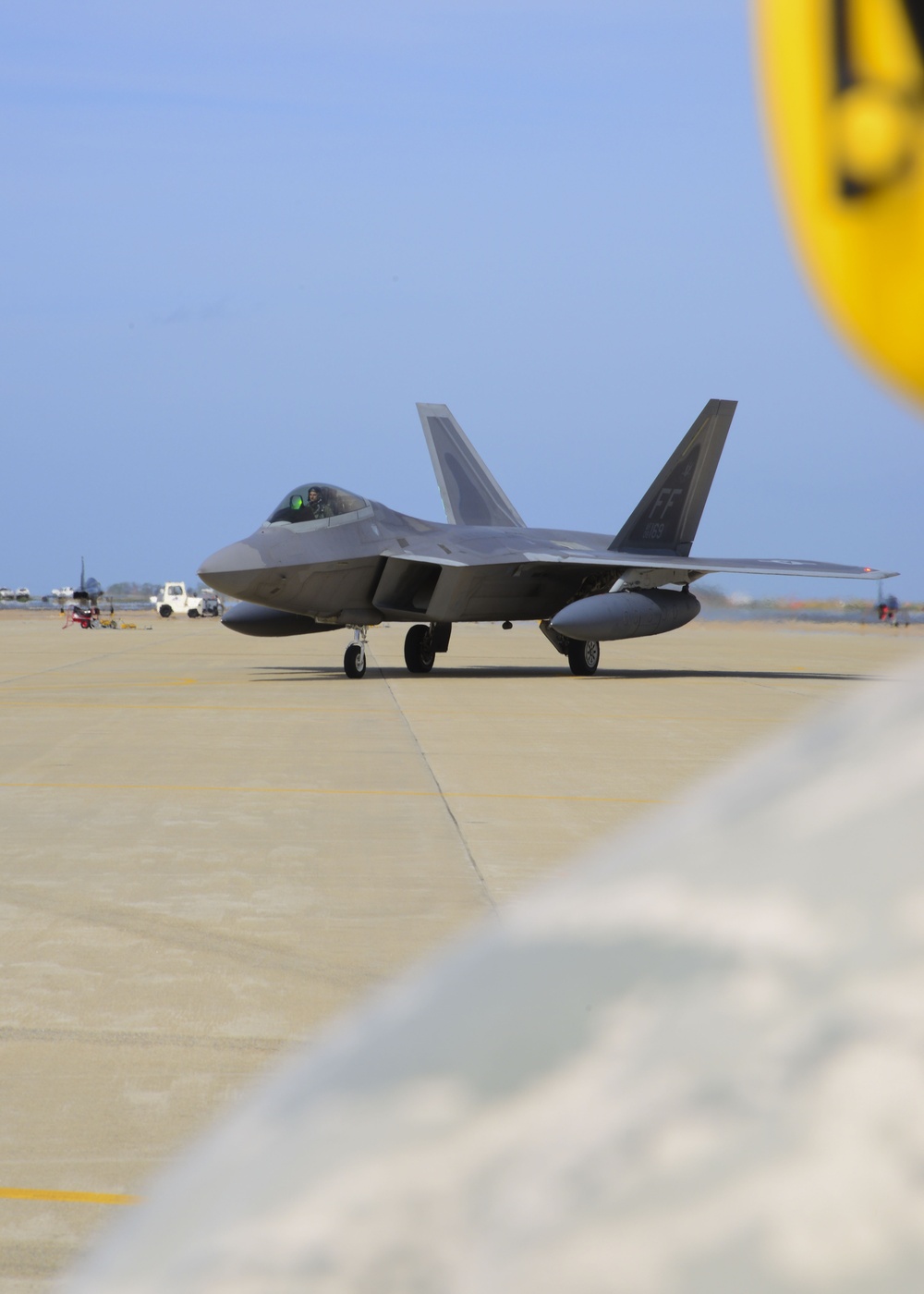 94th FS Airmen, F-22s return from Japan