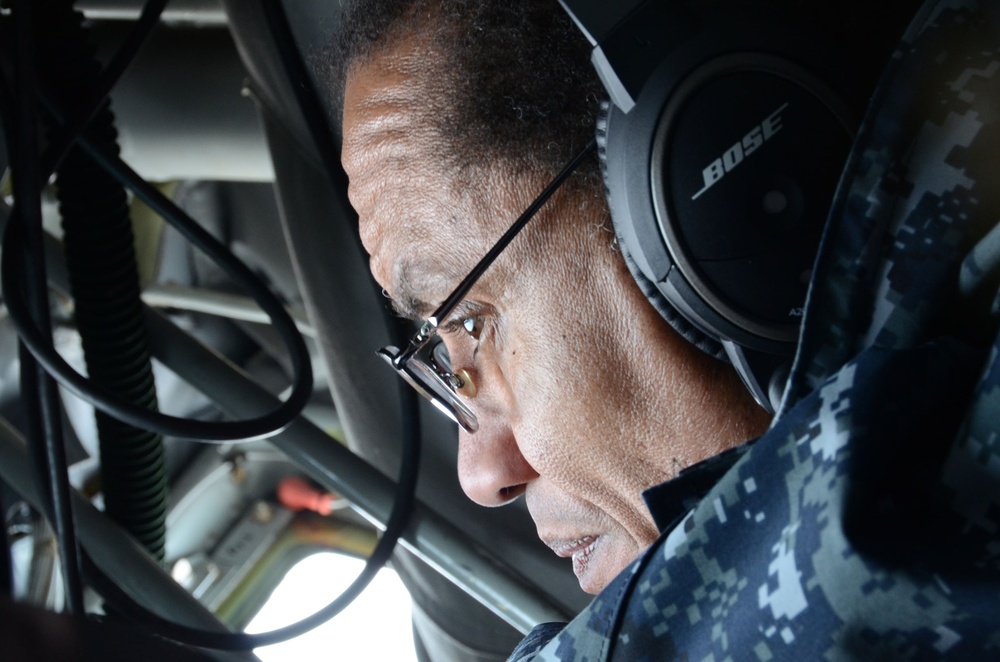 Adm. Haney watching out the boom window