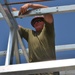 Engineers construct roof at Yorke school construction site in Belize City