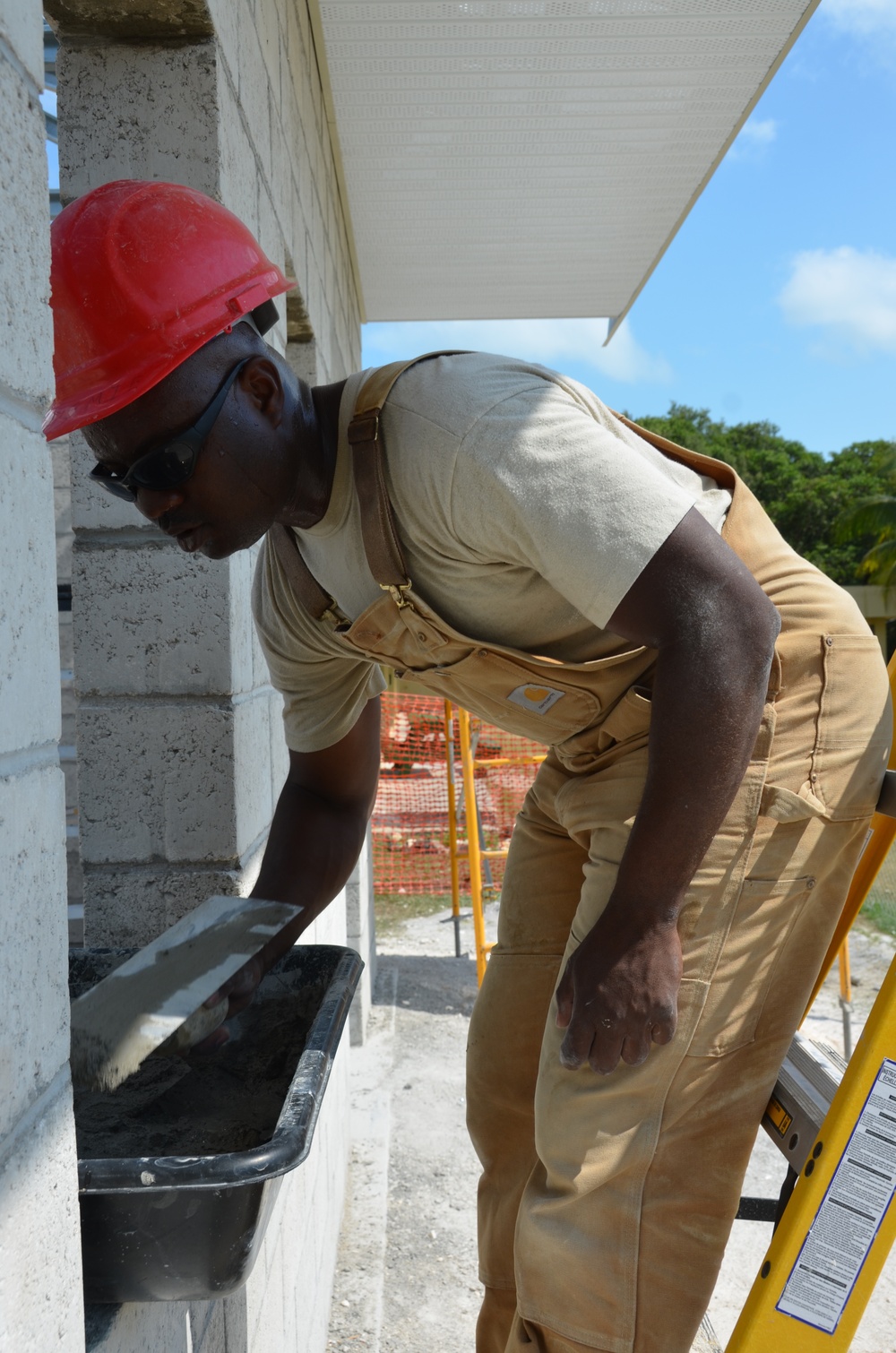 Engineers construct roof at Yorke school construction site in Belize City