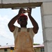 Engineers construct roof at Yorke school construction site in Belize City