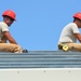 Engineers construct roof at Yorke school construction site in Belize City