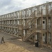 US airman walks towards a housing area composed of containerized living units at Camp Lemonnier, Djibouti, March 27, 2014