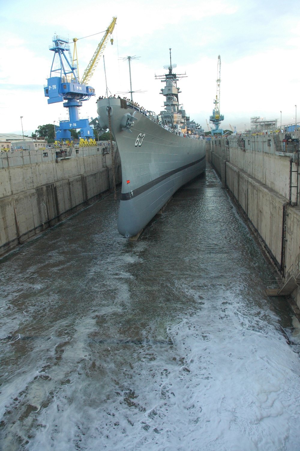 The Battleship Missouri rests on blocks at Pearl Harbor Naval Shipyard
