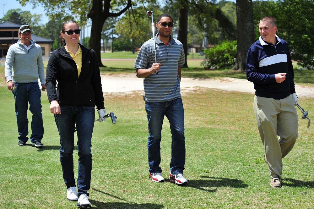 Golfers ‘chip in’ for Sexual Assault Awareness Month