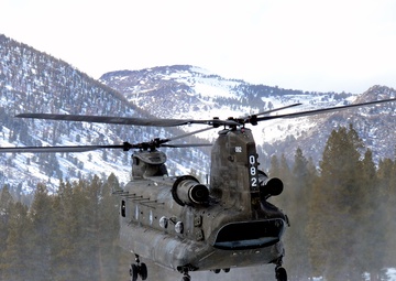 California National Guard Chinooks airlift Marines training in mountain warfare tactics to high elevation landing zones