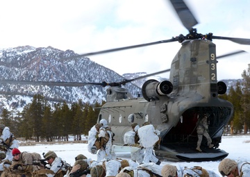 California National Guard Chinooks airlift Marines training in mountain warfare tactics to high elevation landing zones