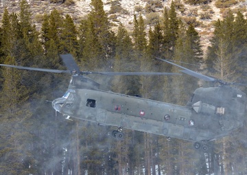 California National Guard Chinooks airlift Marines training in mountain warfare tactics to high elevation landing zones
