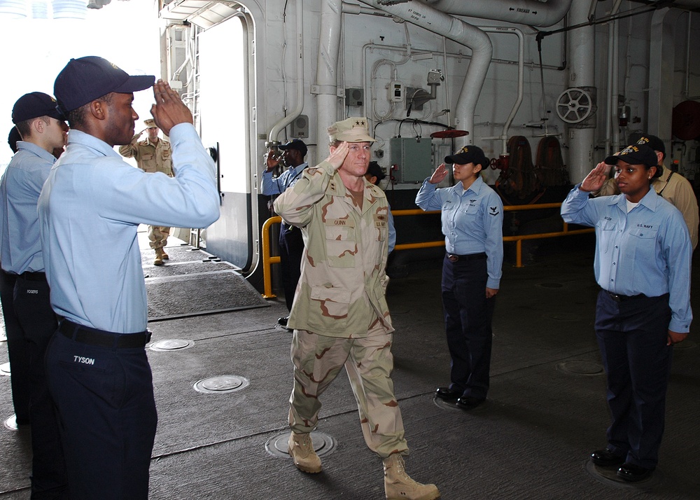 Rear Adm. Kevin M. Quinn embarks aboard USS Iwo Jima