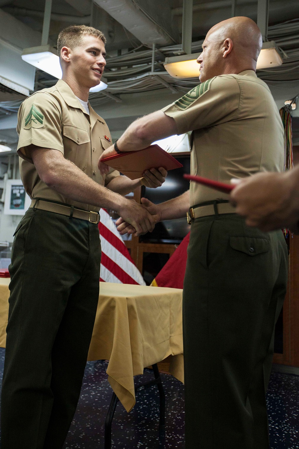 Marines, Sailor graduate corporals course at sea