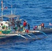 USS John S. McCain sailors assist Philippine fishing vessel