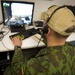 Lithuanian Joint Terminal Attack Controllers practice their skills using simulations equipment at JMRC