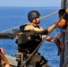 USS Lake Champlain sailors rescue disabled skiff passengers