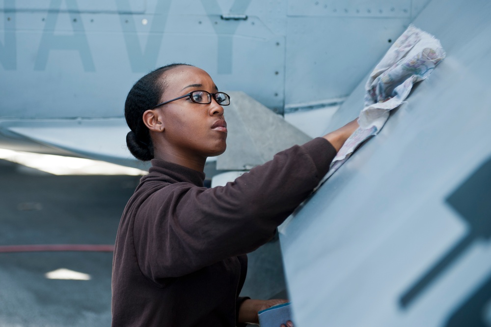 Wiping down an F/A-18C Hornet