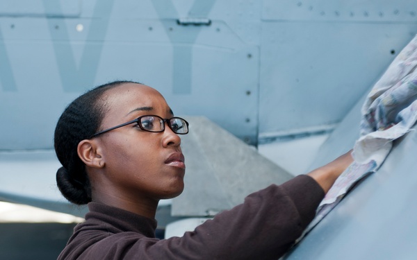 Wiping down an F/A-18C Hornet