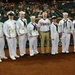 Secretary of the Navy re-enlists Sailors at baseball game