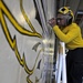 USS Peleliu aviation boatswain's mates paint wings