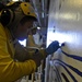 USS Peleliu aviation boatswain's mates paint wings