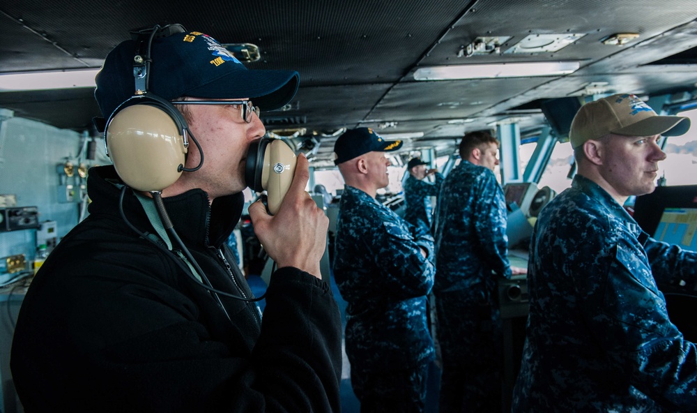 Stennis' navigation bridge team works during Stennis' departure from dry dock