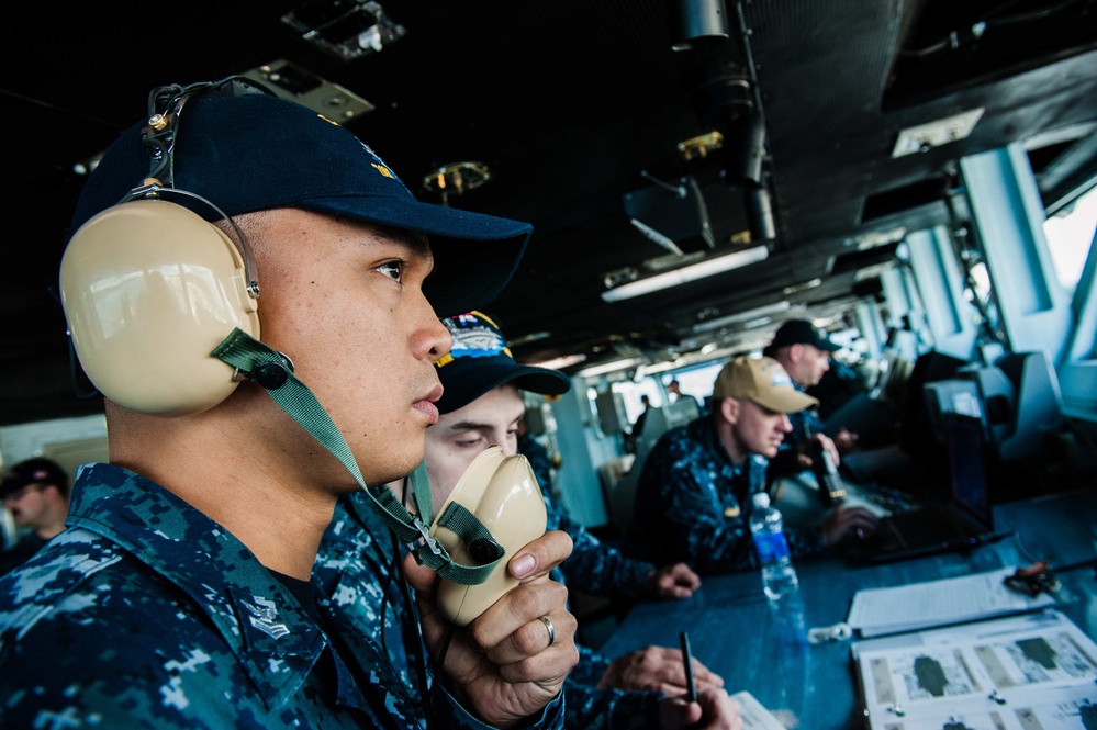 Stennis' navigation bridge team works during Stennis' departure from dry dock