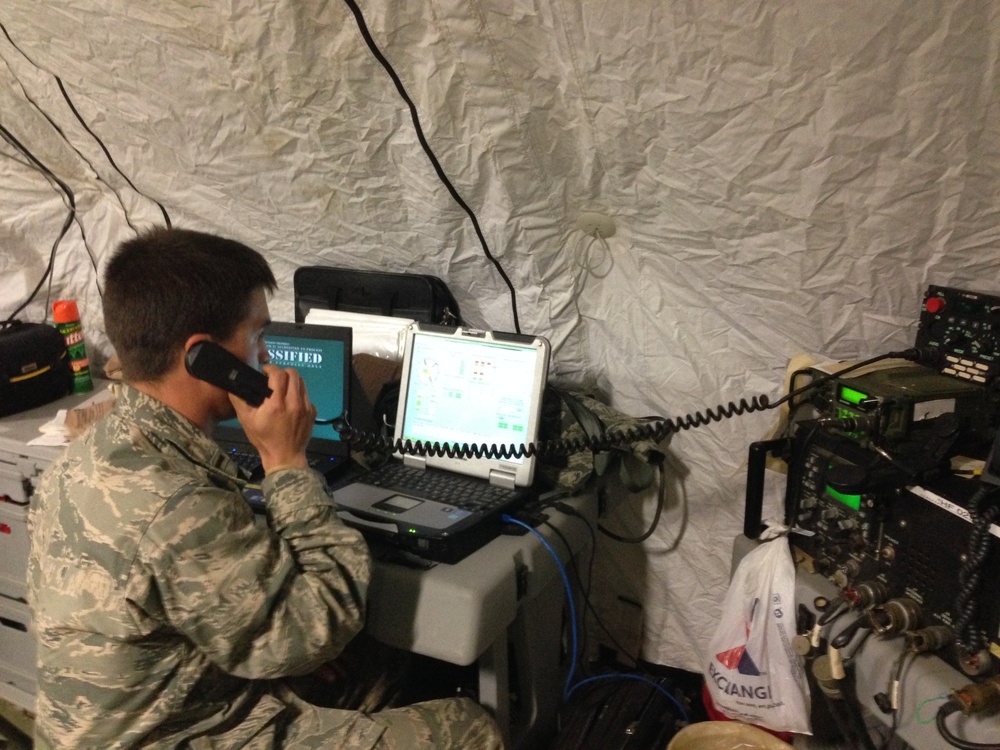 Staff weather officer provides critical weather updates during Beyond the Horozon Guatemala 2014