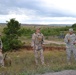 Michigan National Guard Adjutant General briefs with Latvian JTAC team members at Camp Grayling airfield