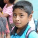 A Guatemalan boy smiles as US service members tour his current school at El Roble during Beyond the Horizon 2014 on April 7