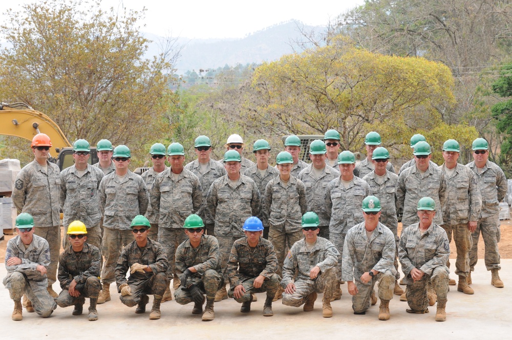 Members of the 188th Fighter Wing, Civil Engineering Squadron, Arkansas Air National Guard pose with Guatemalan engineers of the 2nd Infantry Brigade at the end of the first 2 weeks of construction in Guatemala on April 17