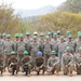 Members of the 188th Fighter Wing, Civil Engineering Squadron, Arkansas Air National Guard pose with Guatemalan engineers of the 2nd Infantry Brigade at the end of the first 2 weeks of construction in Guatemala on April 17