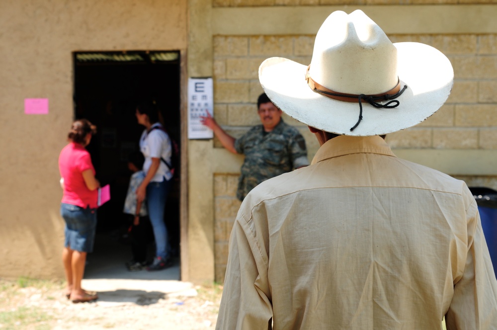 A man takes an Acuity Test at a Medical Readiness Training Exercise at Caseria Los Limones Wednesday, April 23, 2014