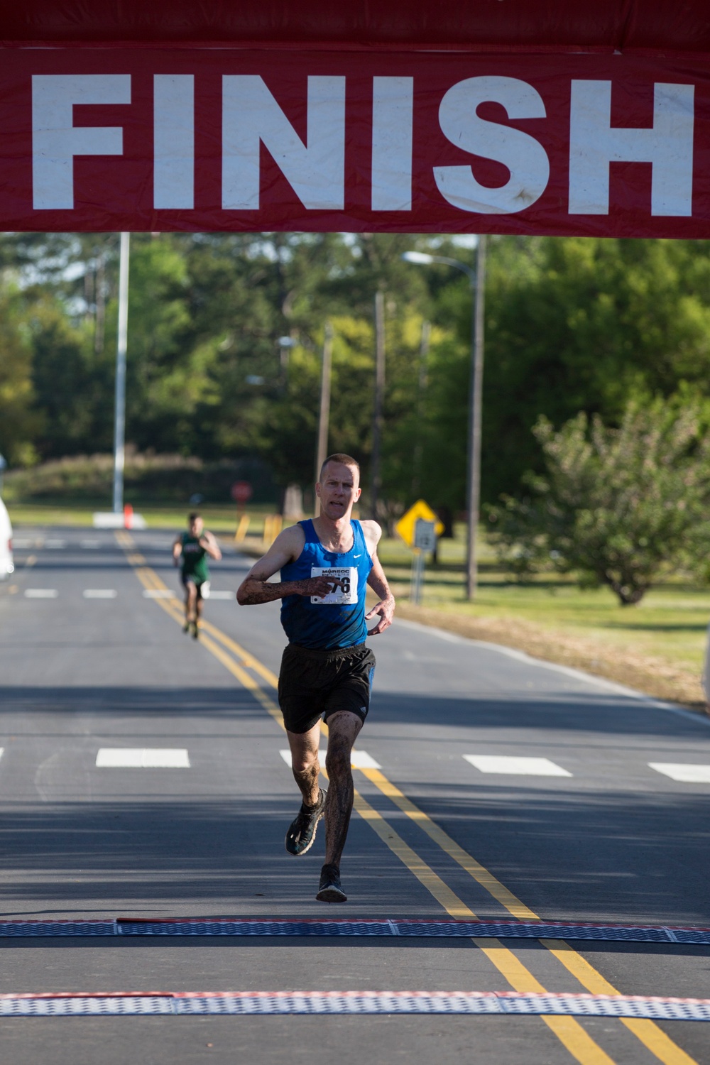 Mud, Sweat and Tears: Runners temper their mettle during MARSOC Mud Run