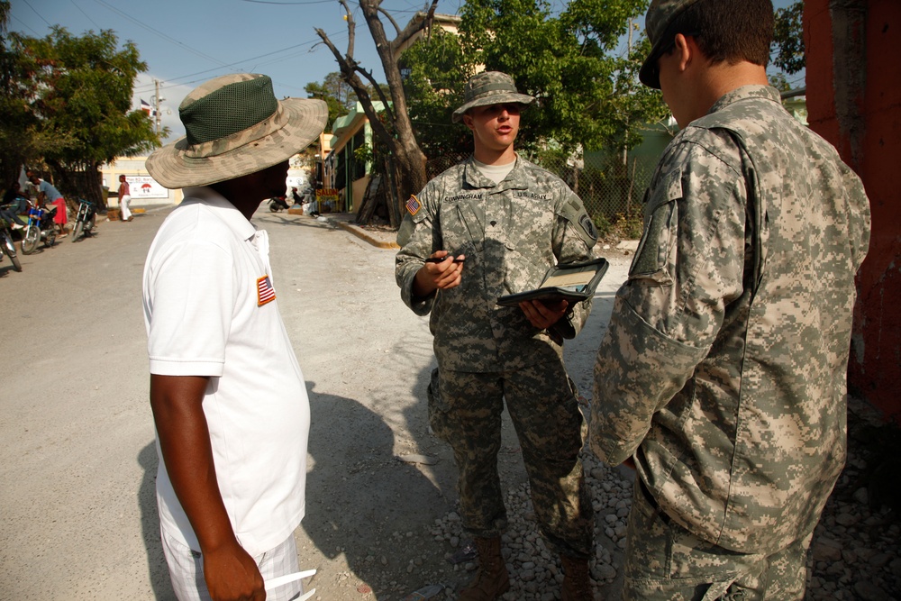 399th Psychological Operations conducts a post assessment of a medical readiness training exercise