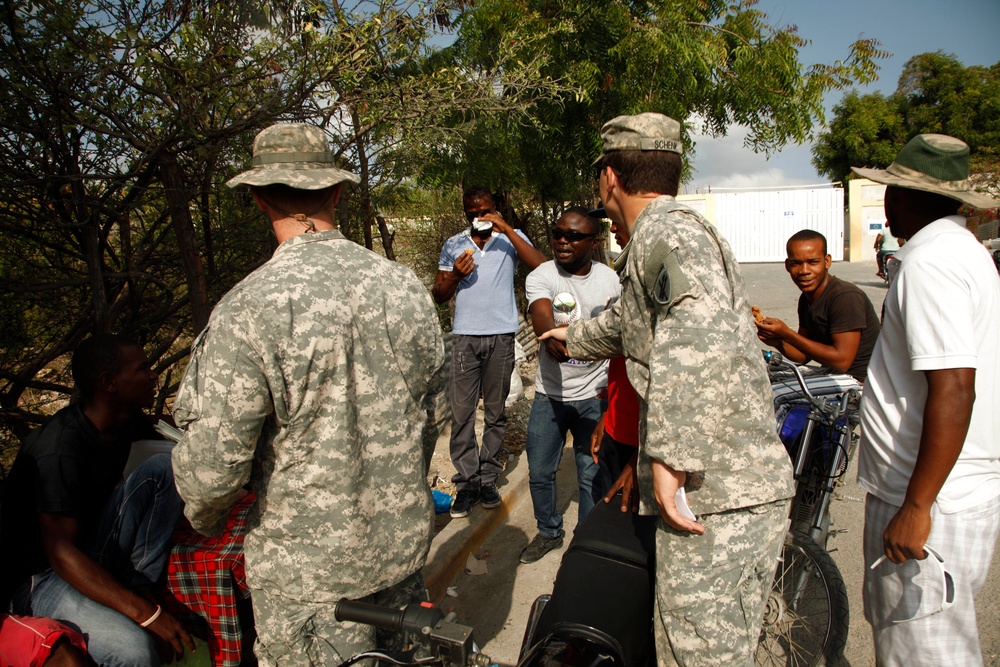 399th Psychological Operations conducts a post assessment of a medical readiness training exercise