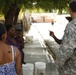 399th Psychological Operations conducts a post assessment of a medical readiness training exercise