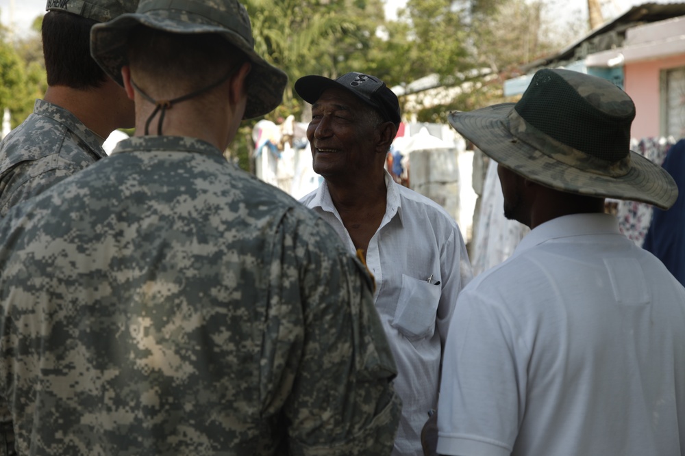 399th Psychological Operations conducts a post assessment of a medical readiness training exercise