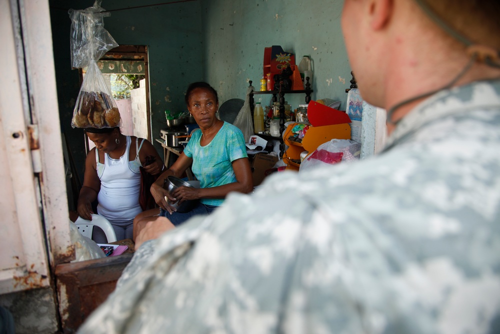 399th Psychological Operations conducts a post assessment of a medical readiness training exercise