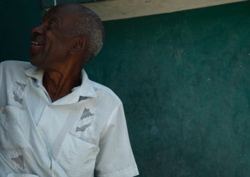 399th Psychological Operations conducts a post assessment of a medical readiness training exercise